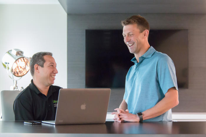 CW Best Places to Work in IT [2017] - Ultimate's CTO Adam Rogers (right), programmer Lenis Hernandez